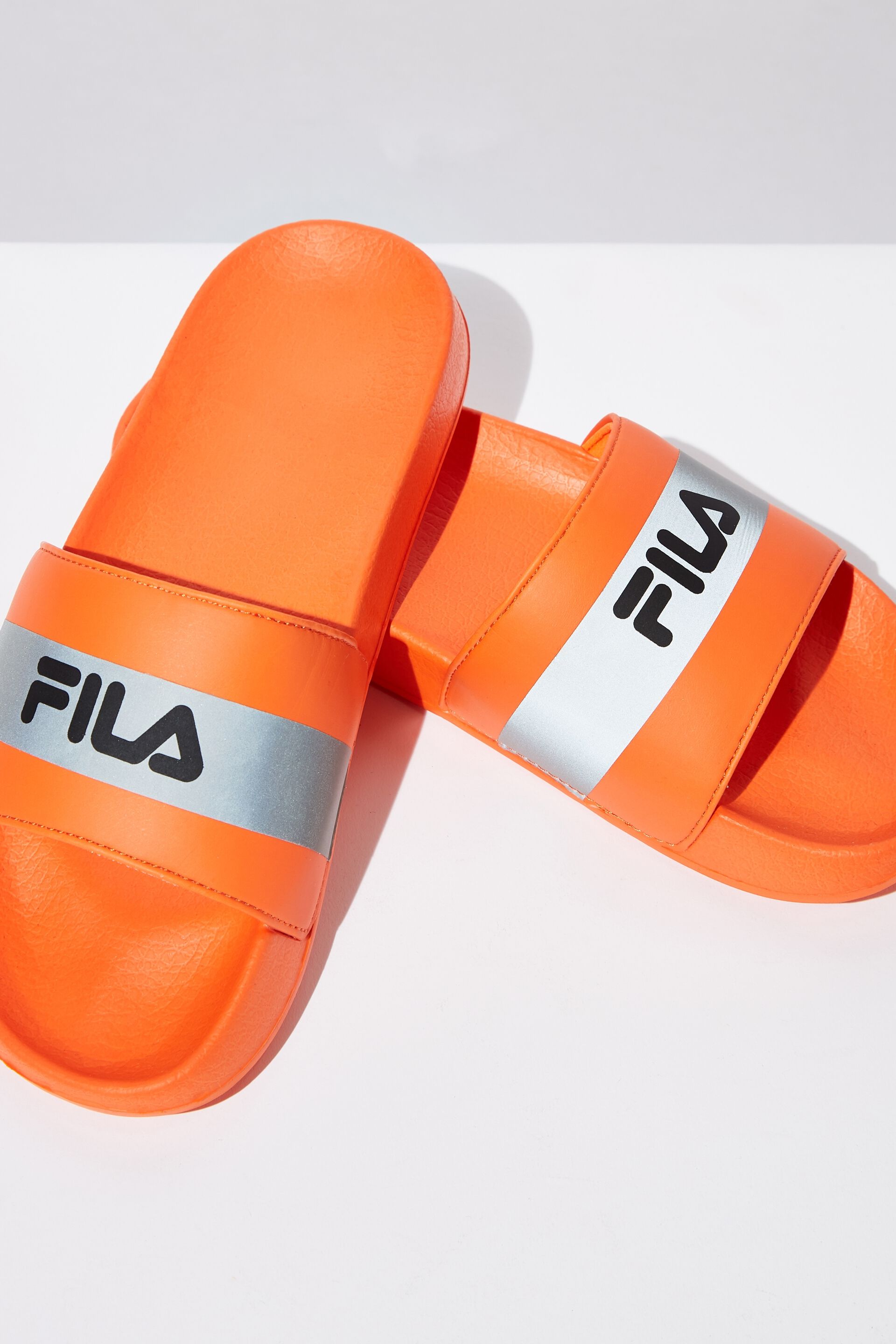 orange fila slides